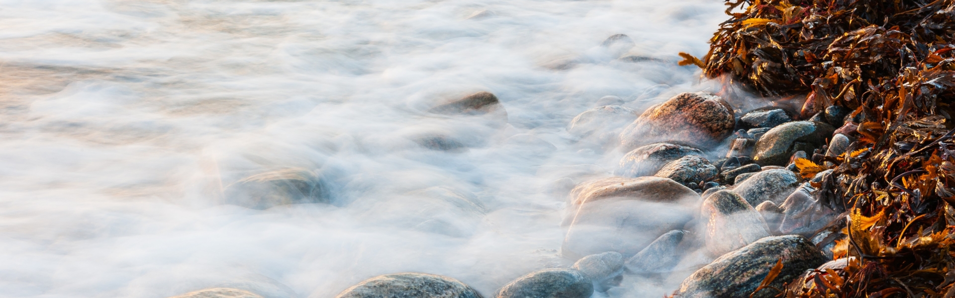 Waves crashing on beach, Sweden.